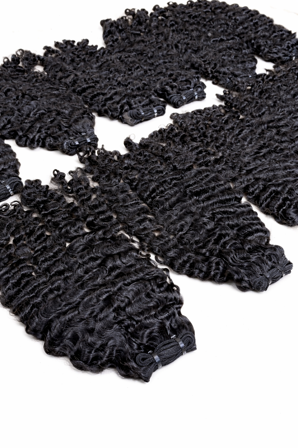 ‘Miss Behavin’ Raw Burmese Curly Bundles